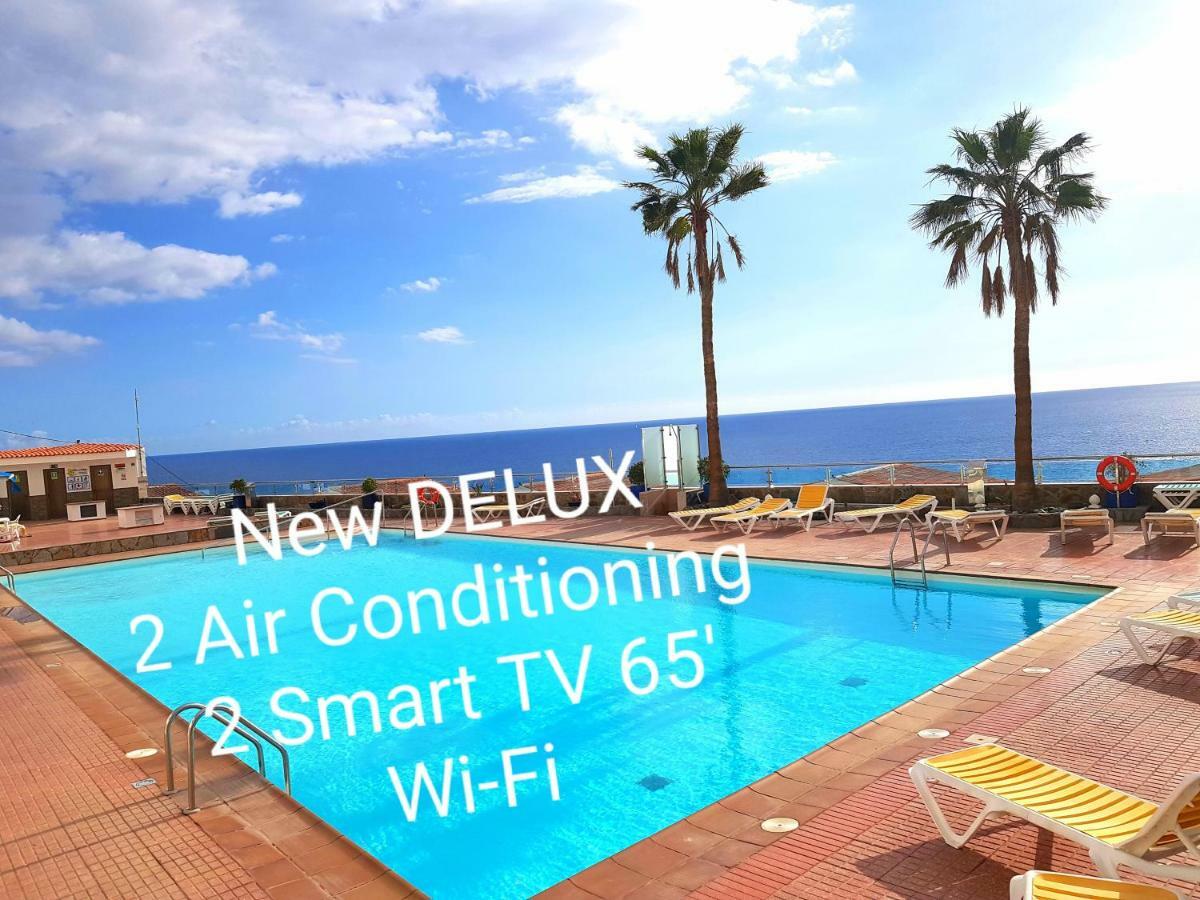 شقة Deluxe Seaview-Sunsets !Transfe-R Inc! Pool,2Aircond,2Tv65",600Mb Dishwasher,,2 Beaches,Anfi-View باتالاباكا المظهر الخارجي الصورة